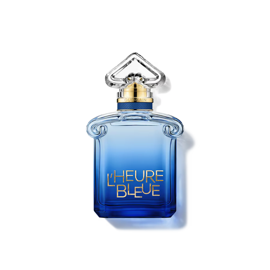 L'Heure Bleue perfume bottle by Guerlain, featuring a blue gradient glass body with gold lettering and a silver-toned cap, set against a plain white background.