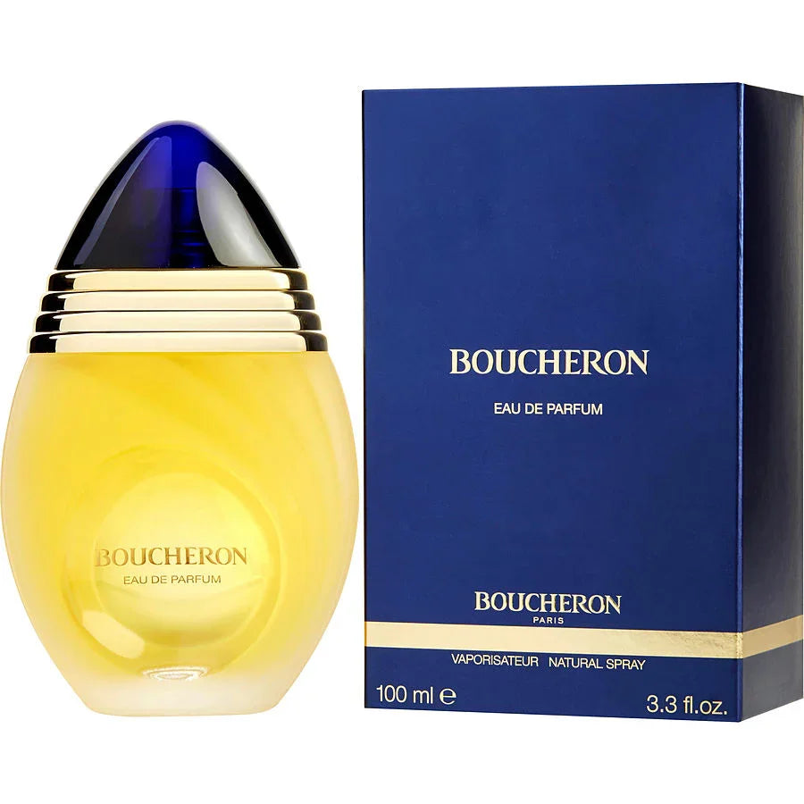 Boucheron Eau de Parfum 100ml bottle with blue cap and gold accents, next to navy blue box
