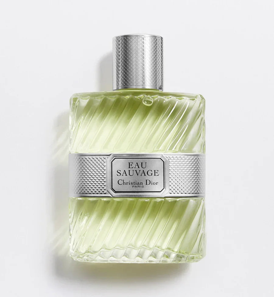 Christian Dior Eau Sauvage perfume bottle with textured glass and silver cap, luxury men's fragrance