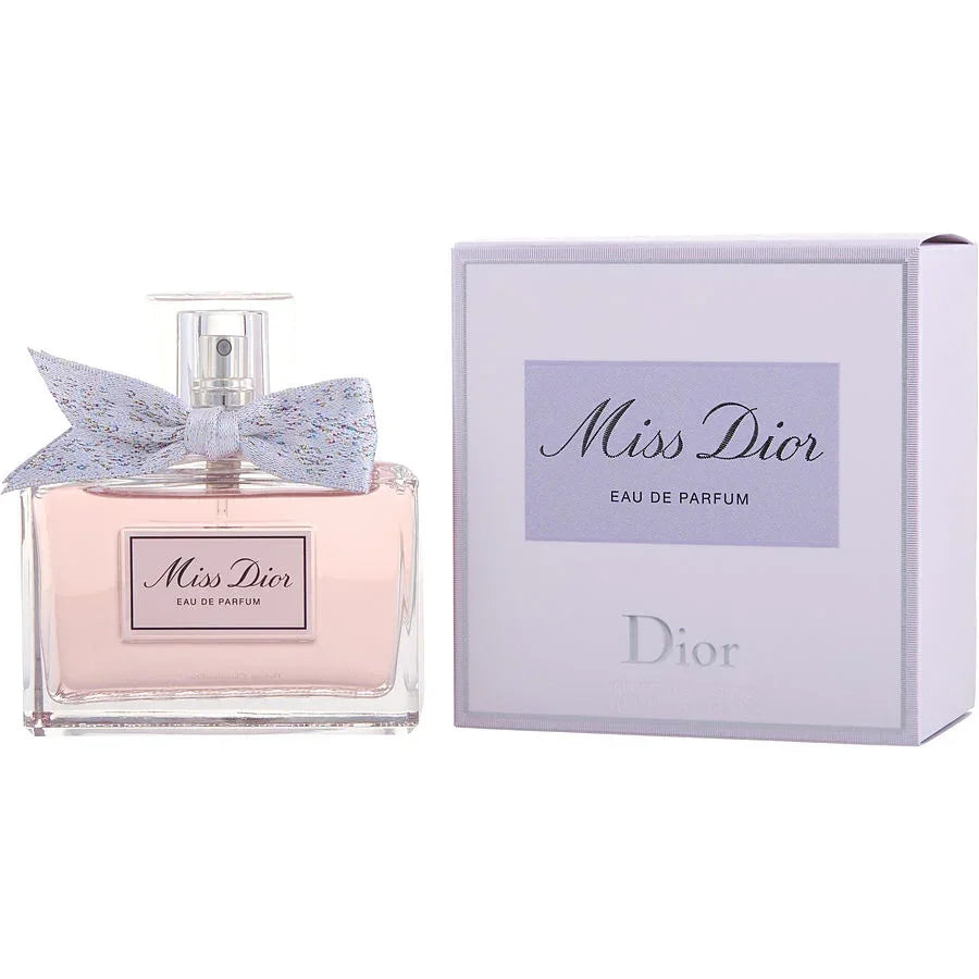 Miss Dior Eau de Parfum bottle with bow and gift box, luxury women's fragrance