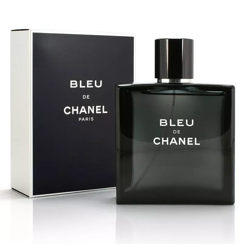 A black bottle of Chanel Bleu de Chanel Eau de Parfum with a white box behind it, both labeled with the product name and brand.