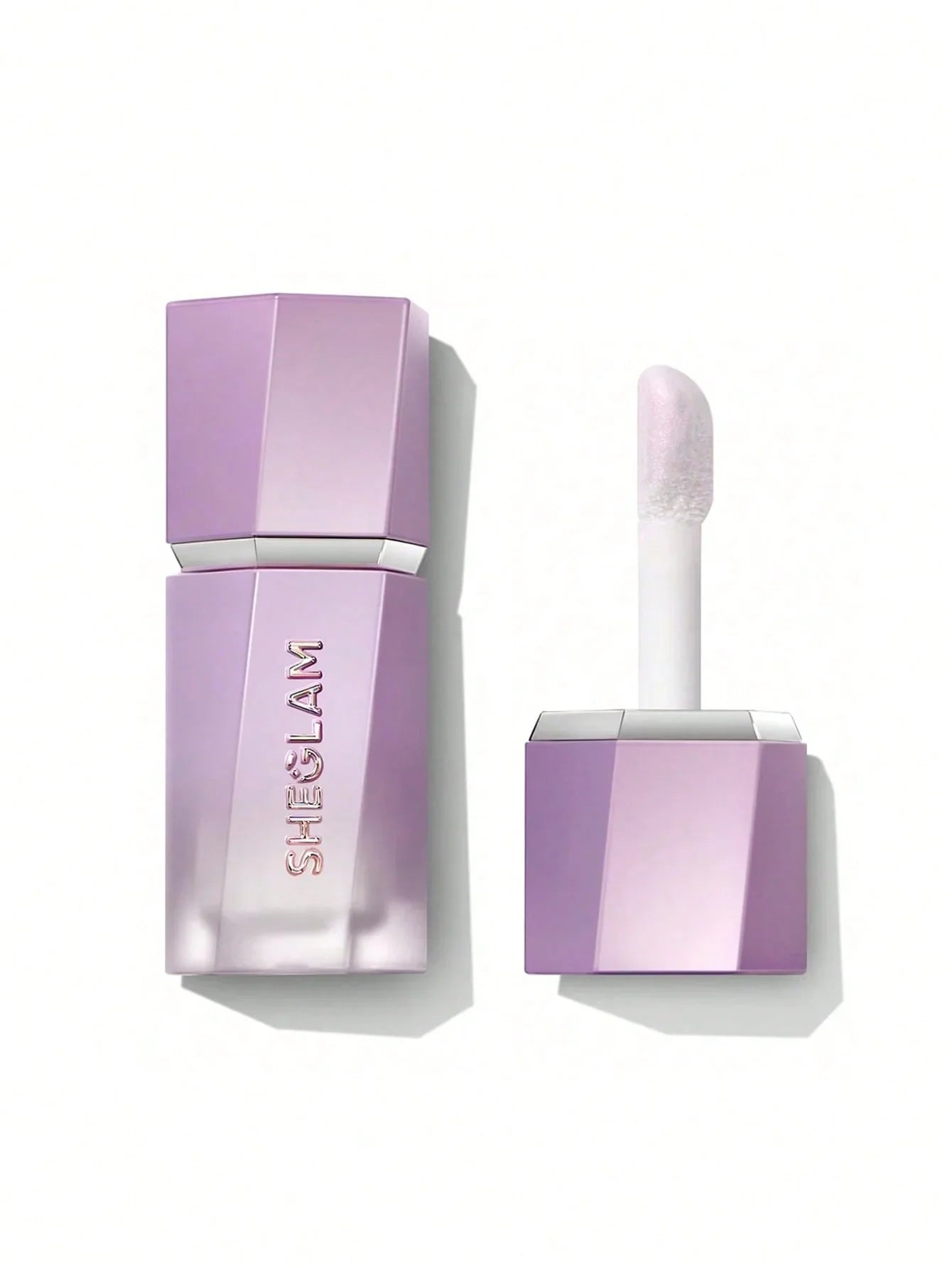 Sheglam shimmer lip gloss in lavender purple packaging with applicator, beauty cosmetics