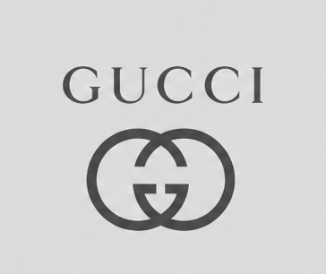 Gucci logo on a light gray background
