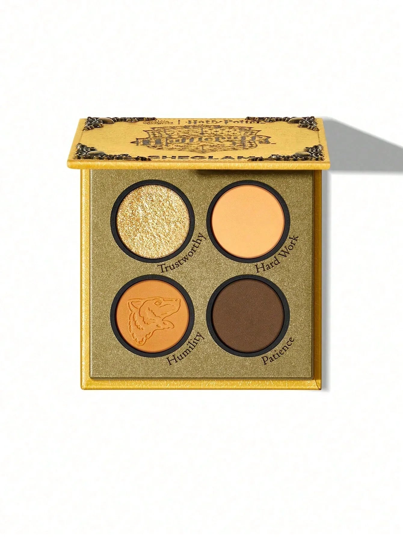 Harry Potter Hufflepuff eyeshadow palette with four shades: Trustworthy, Hard Work, Humility, Patience