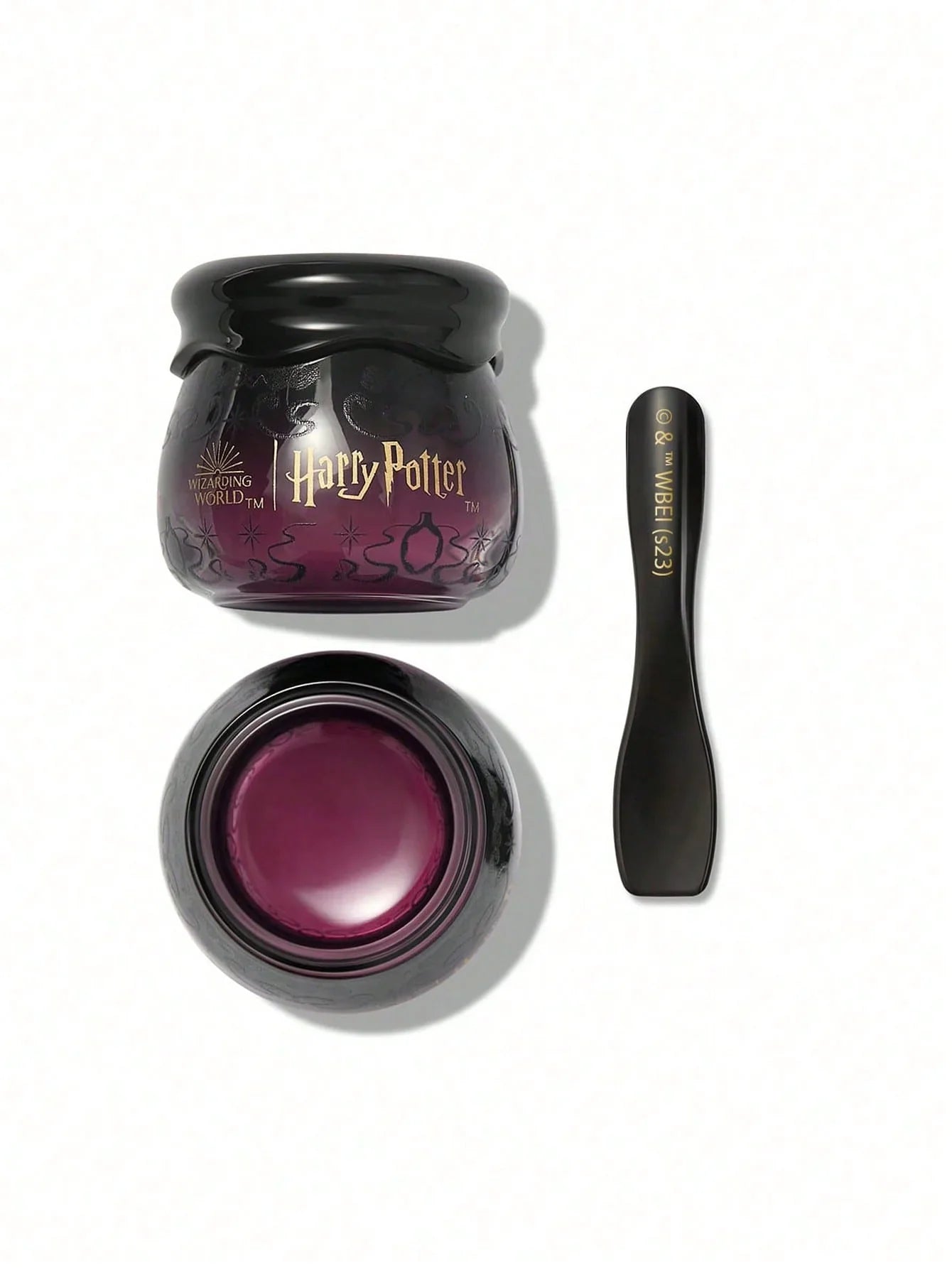 Harry Potter themed purple skincare jar with black lid and applicator spoon, Wizarding World collection