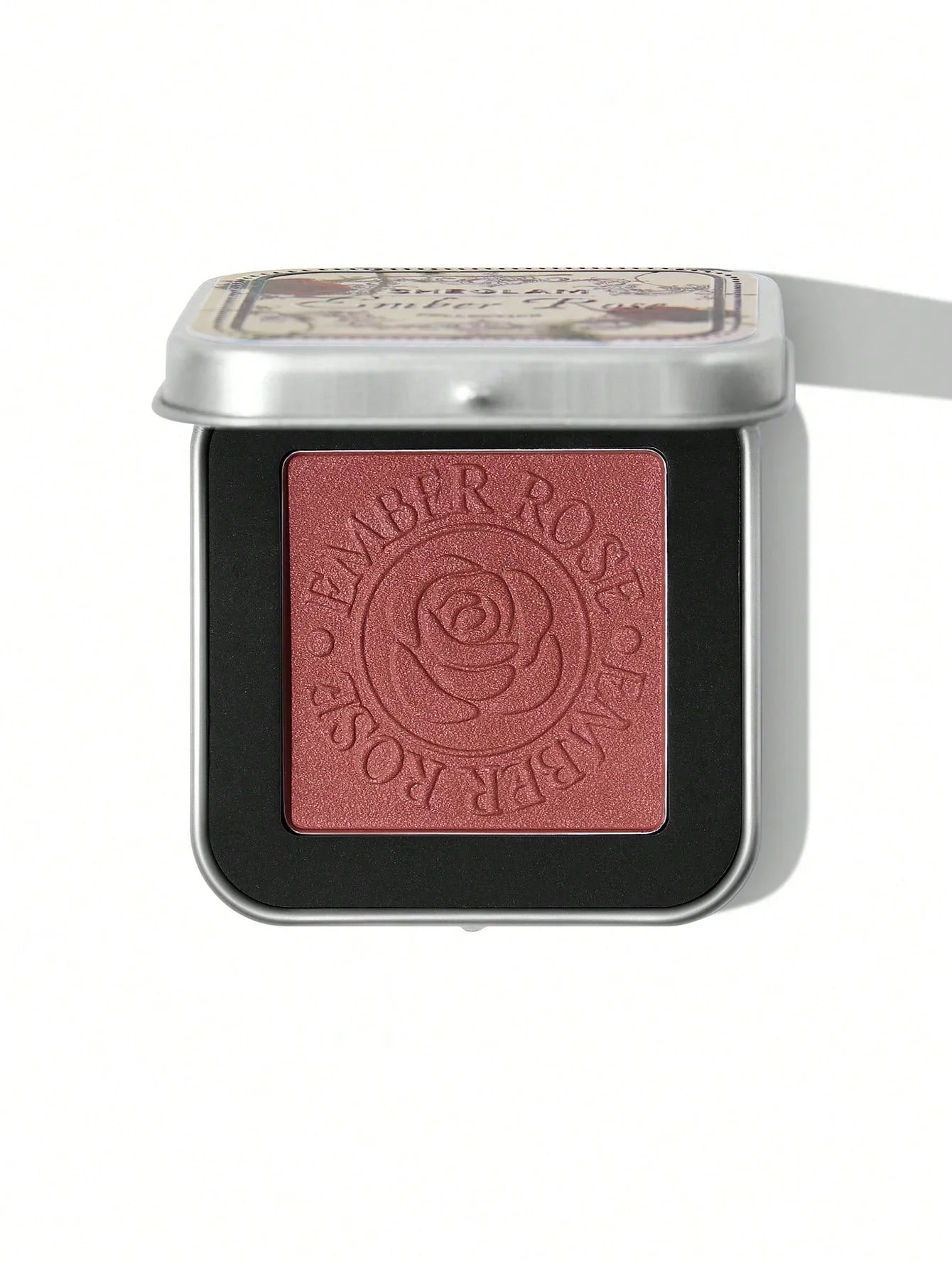Ember Rose blush in metallic tin with rose embossing, perfect for cheeks and makeup routines