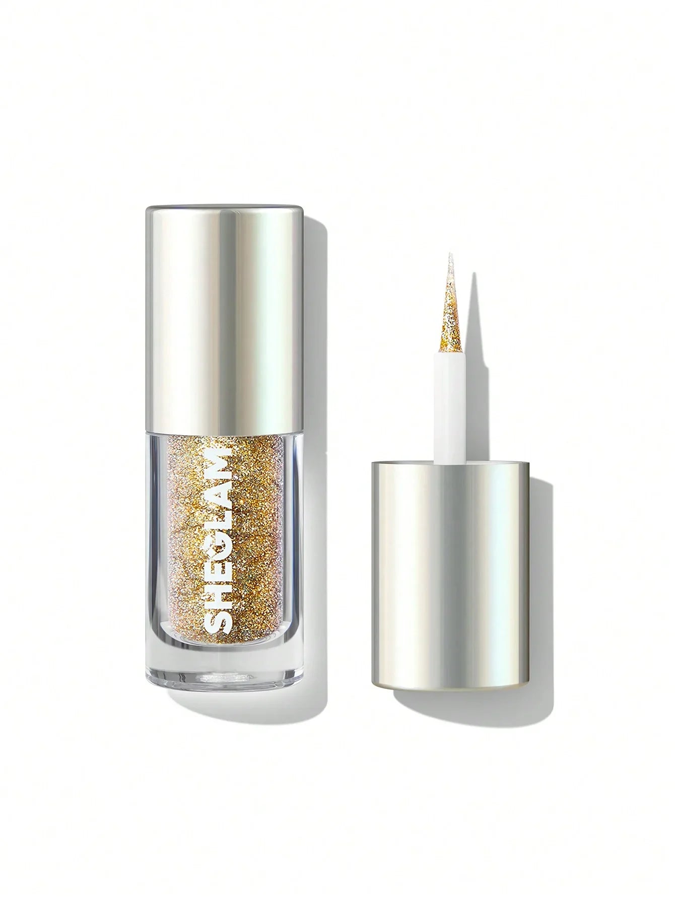 Sheglam gold glitter liquid eyeliner with fine tip applicator, perfect for bold eye makeup looks