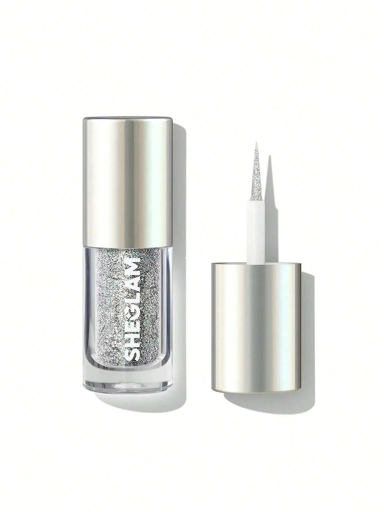 Shimmering silver glitter eyeliner with precision applicator, perfect for bold eye makeup looks.