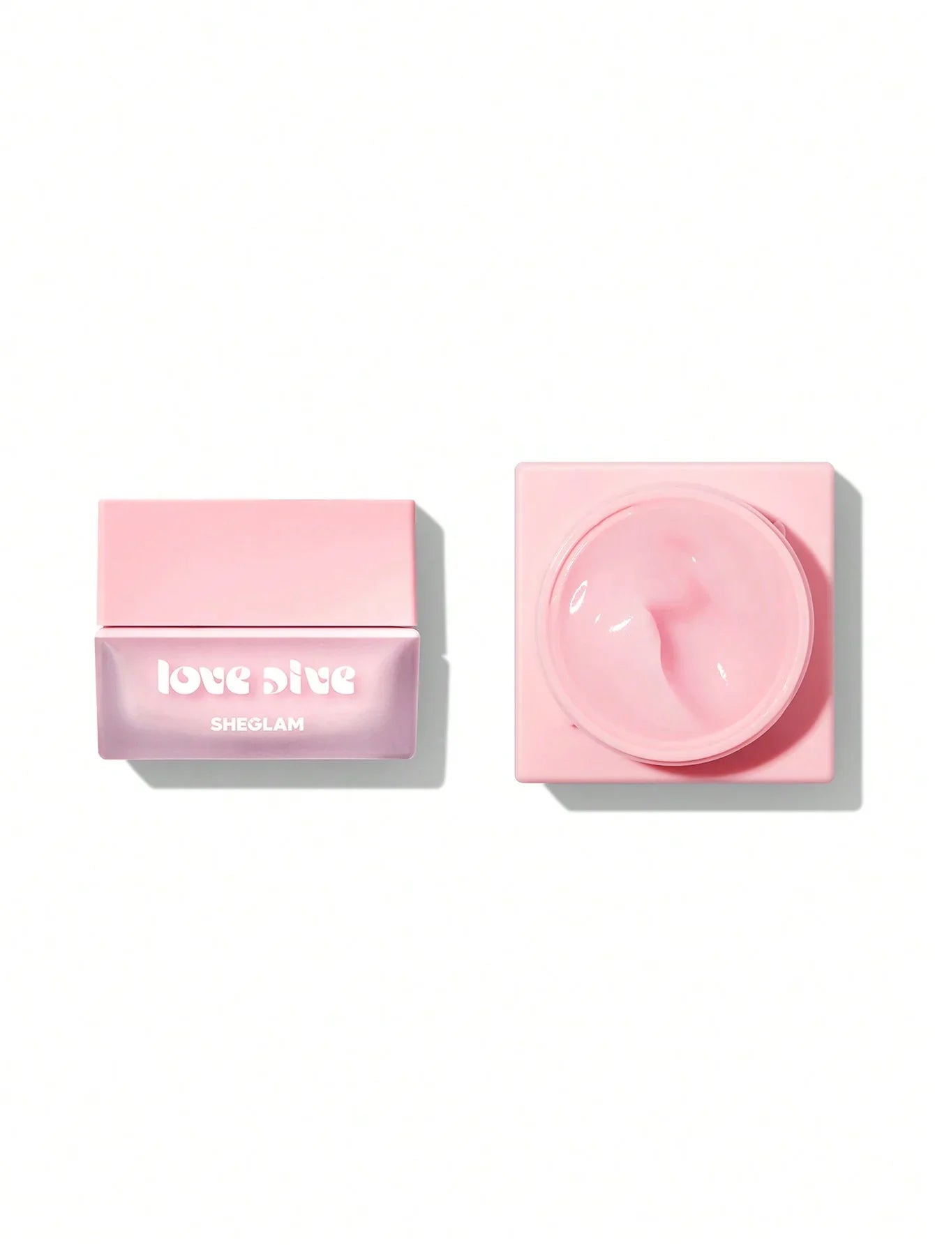 Sheglam Love Dive pink skincare cream in open jar, beauty product for radiant skin