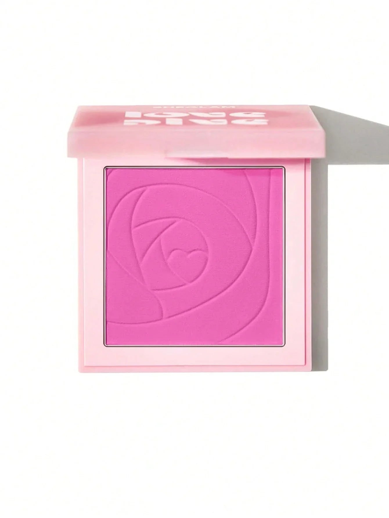 Pink blush compact with rose design, perfect for cheeks and face makeup