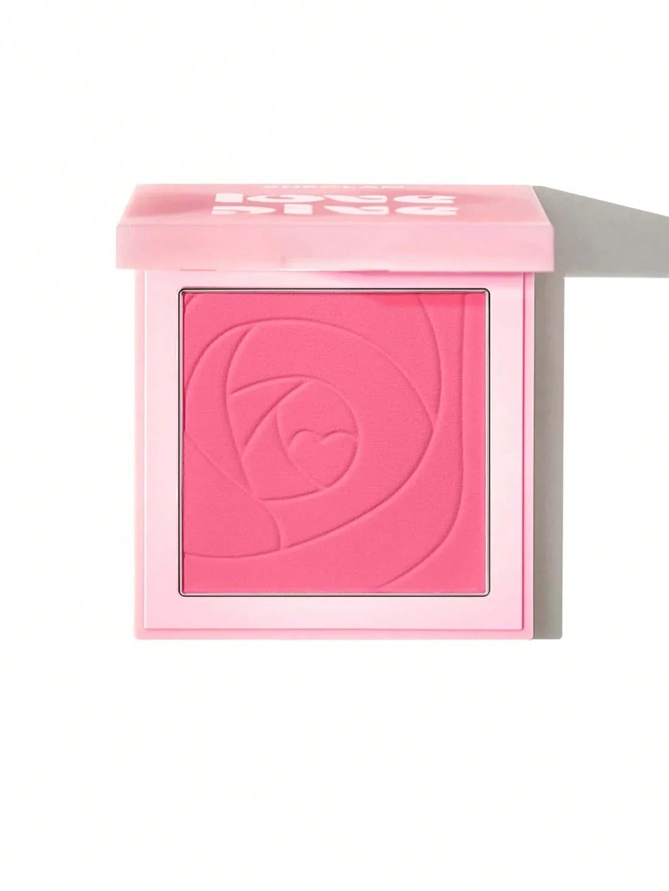 Pink blush compact with rose heart design, beauty makeup product