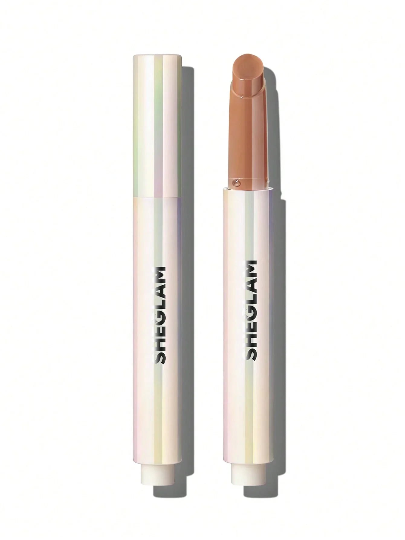 Sheglam creamy concealer stick with iridescent tube, perfect for flawless makeup in Qatar