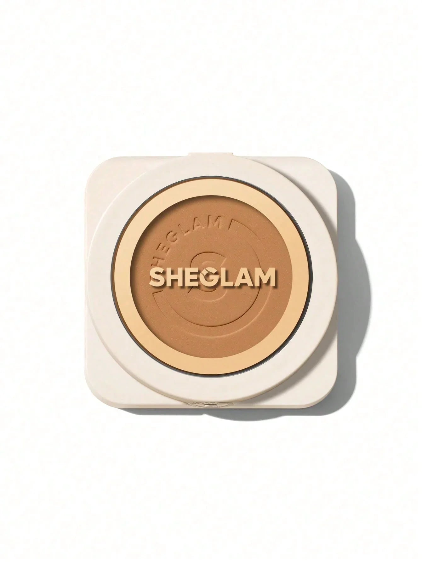 SHEGLAM pressed powder compact with warm brown tone, ideal for flawless makeup finish