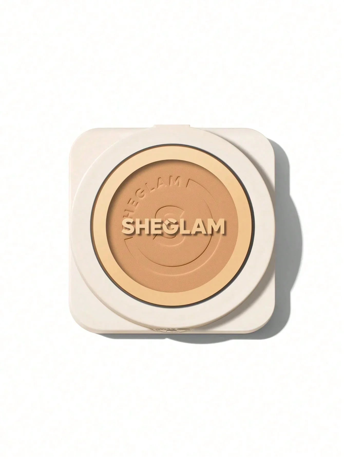 SHEGLAM pressed powder compact with beige casing and embossed logo, beauty makeup product