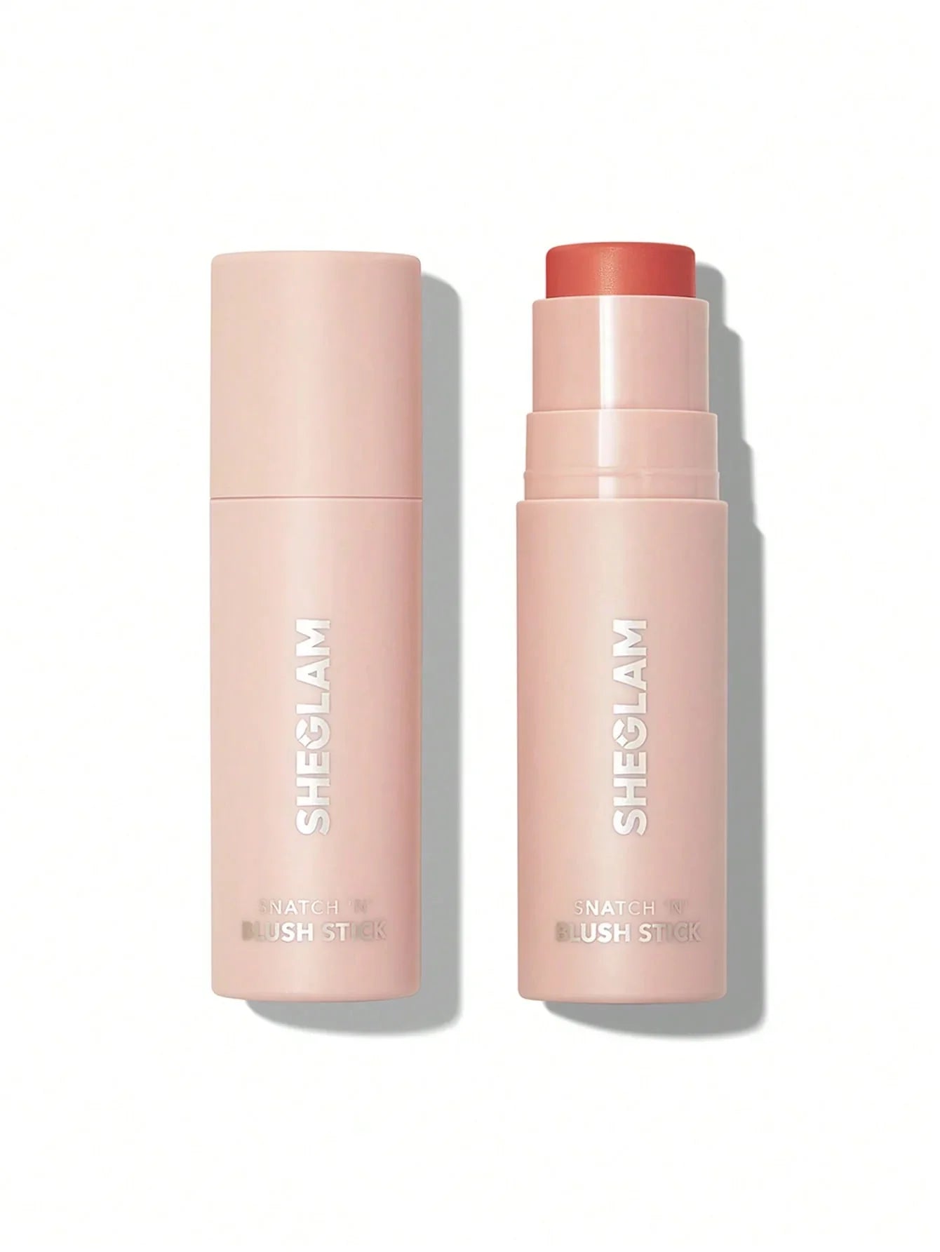 Sheglam Snatch 'N' Blush Stick in soft pink packaging, creamy coral blush tone, beauty makeup product