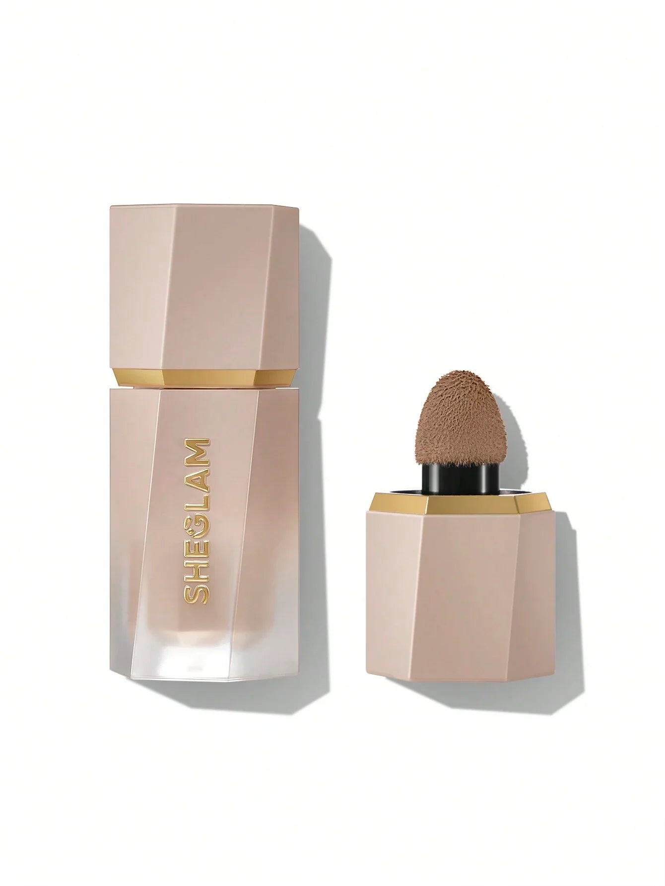 Sheglam liquid foundation with sponge applicator, sleek pink bottle, beauty makeup product