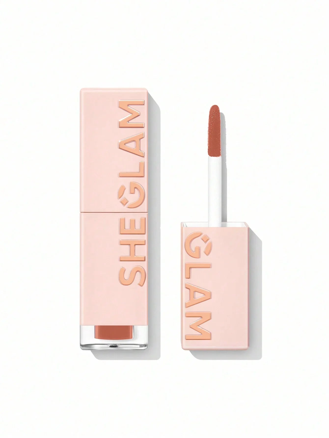She Glam matte lip gloss in nude shade, sleek pink packaging with applicator, beauty cosmetics