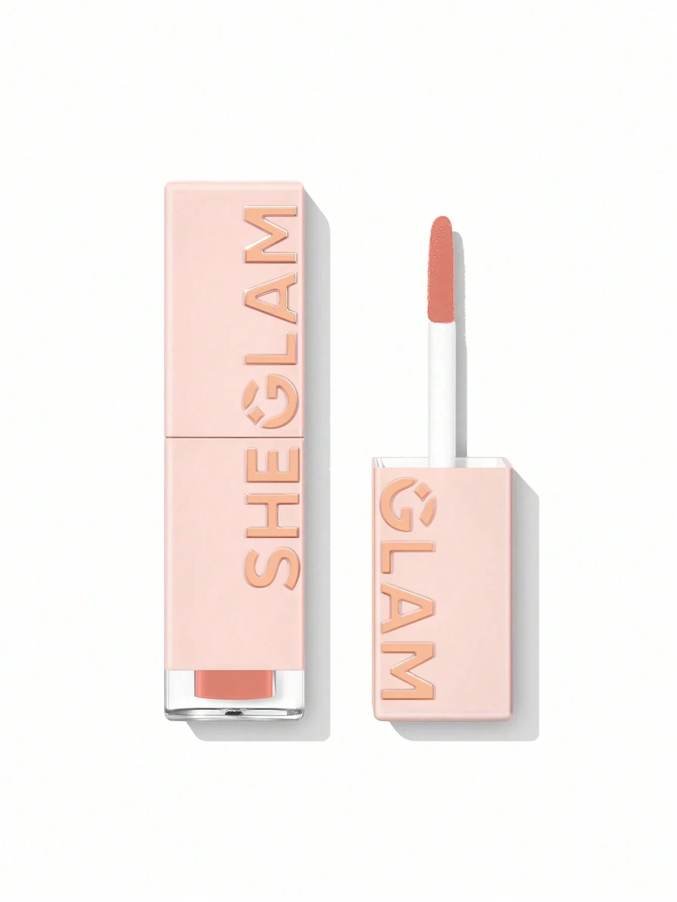 She Glam nude lip gloss with applicator, sleek pink packaging for everyday wear